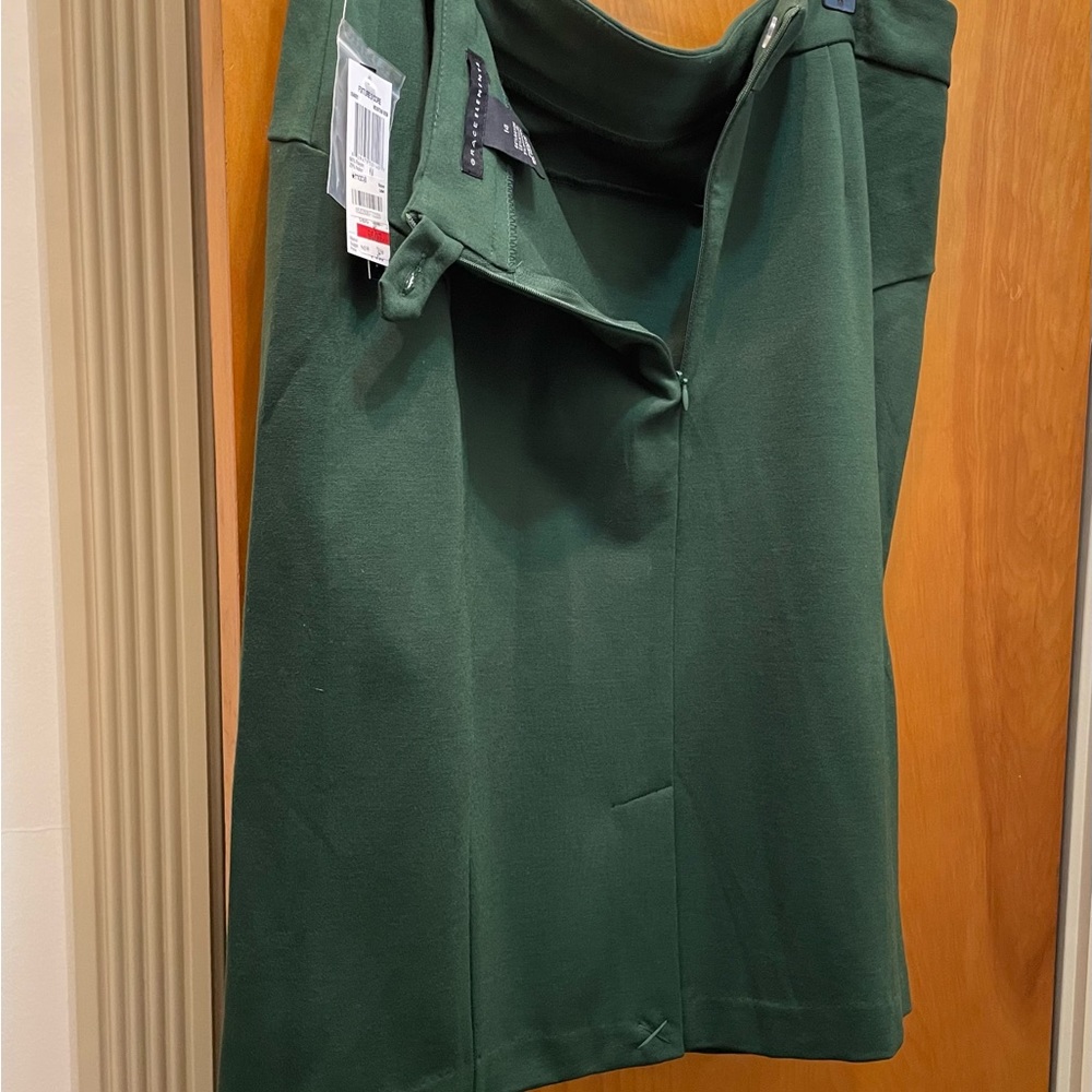 Green knee length skirt.